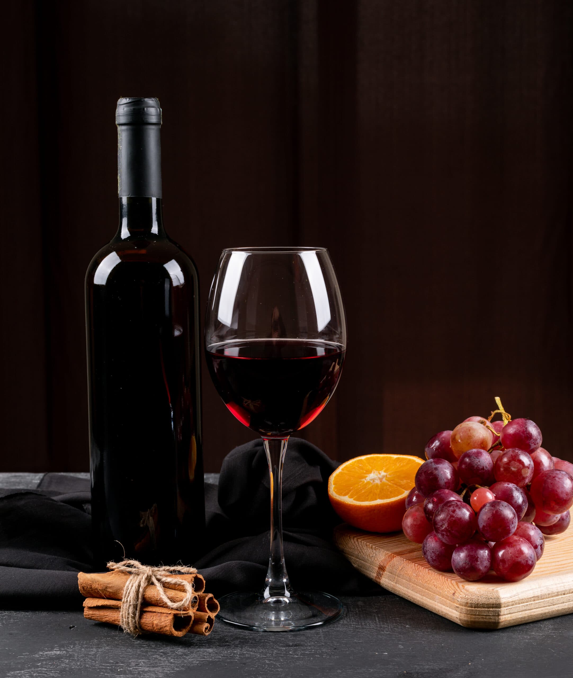 Red wine with grapes